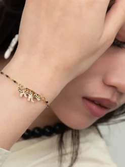 Beaded and leopard print bracelet><noscript><img width=