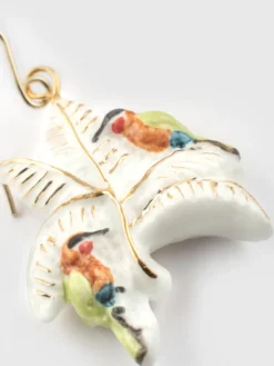 Boucles d'oreilles guêpiers d'Afrique sur palmiers blancs><noscript><img width=