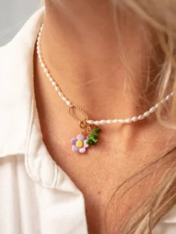 Charm's purple flower><noscript><img width=