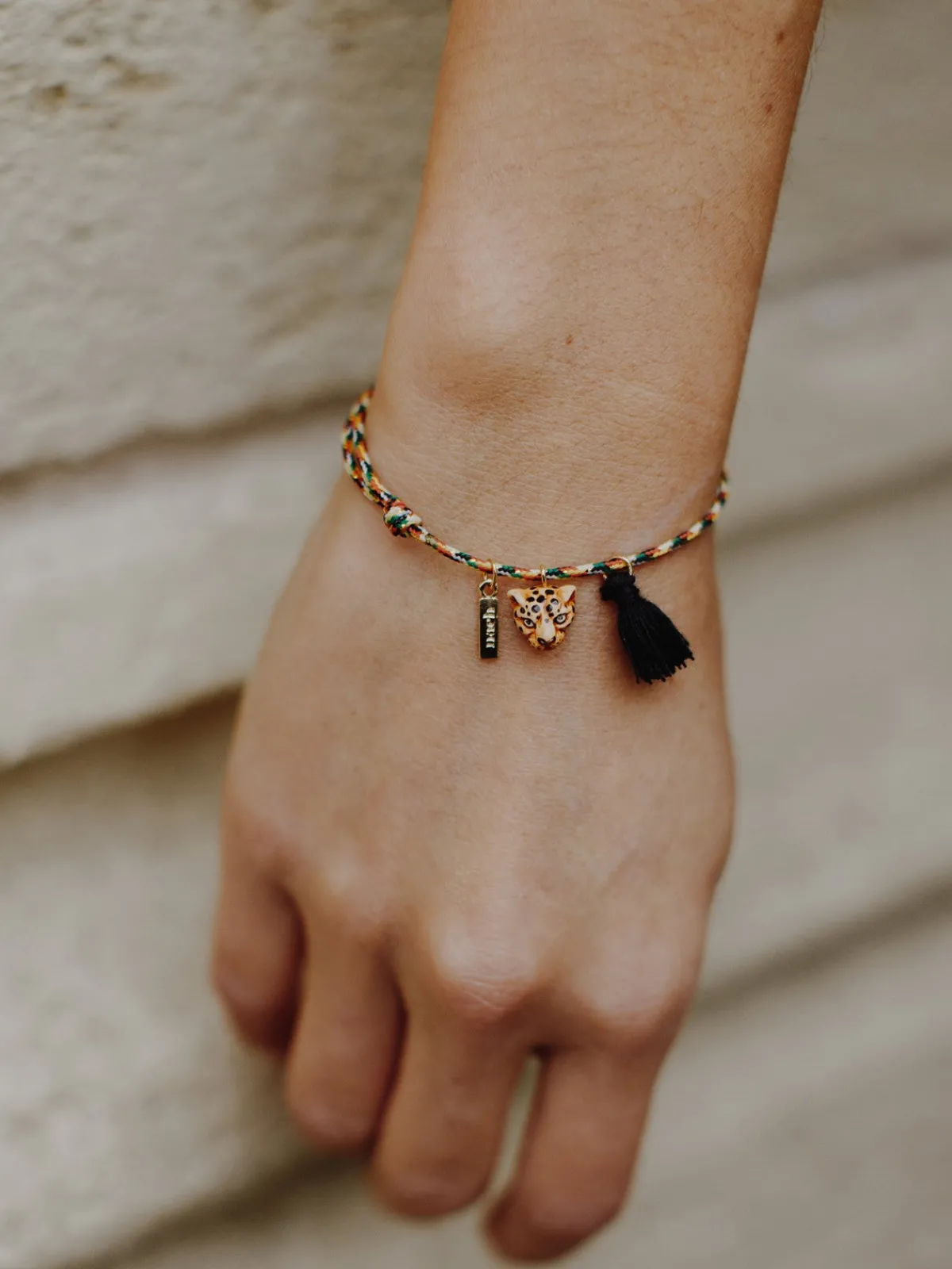 Multicolored leopard cord bracelet with tassel>NACH BIJOUX Online