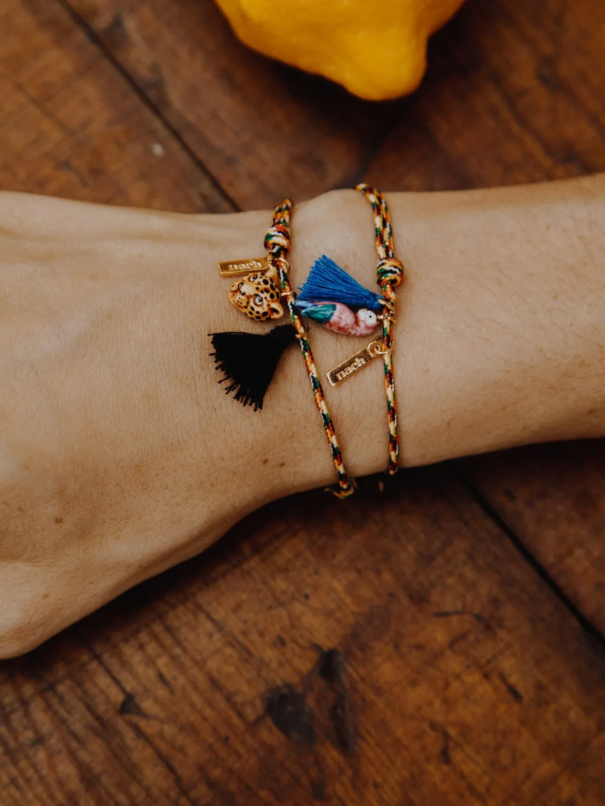 Multicolored pink parrot cord bracelet with tassel>NACH BIJOUX Online