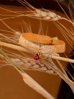 Orange ladybug elastic twistband bracelet><noscript><img width=