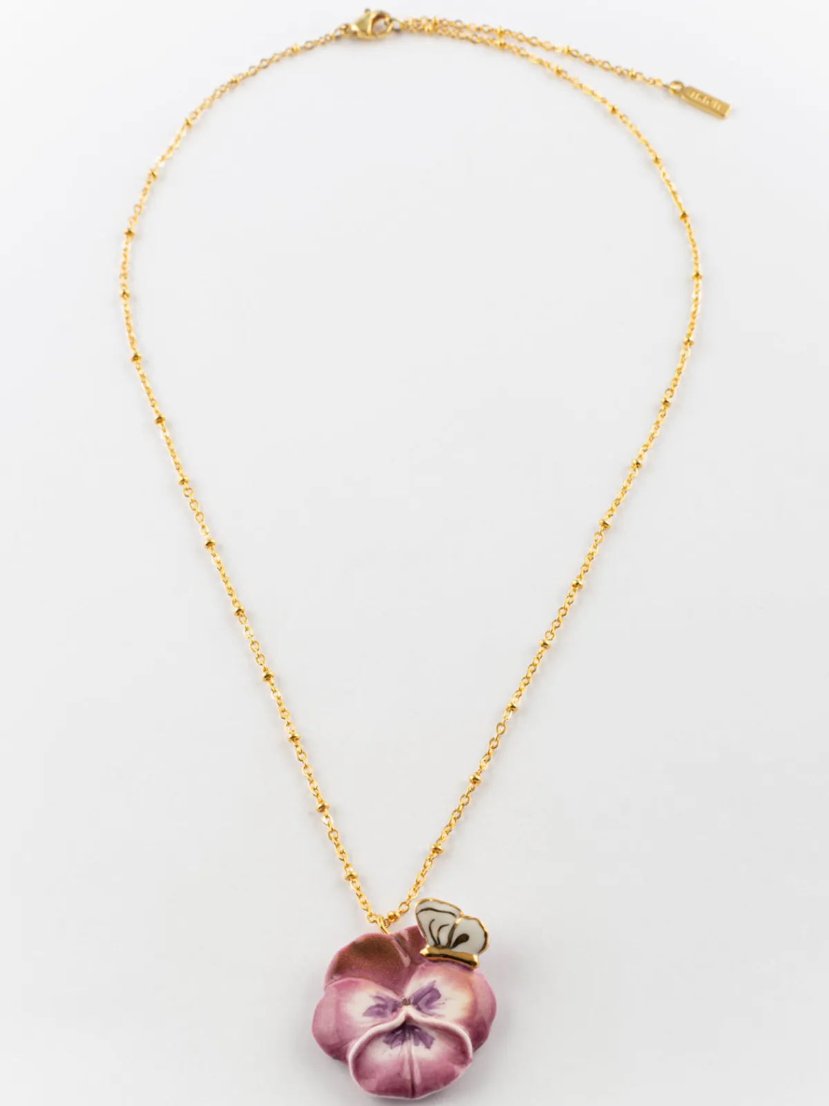 Pansy and purple butterfly necklace>NACH BIJOUX Hot