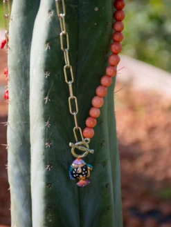 Pearl and spotted fish necklace><noscript><img width=